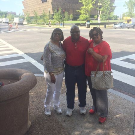 Nate's wife posing picture with her parents